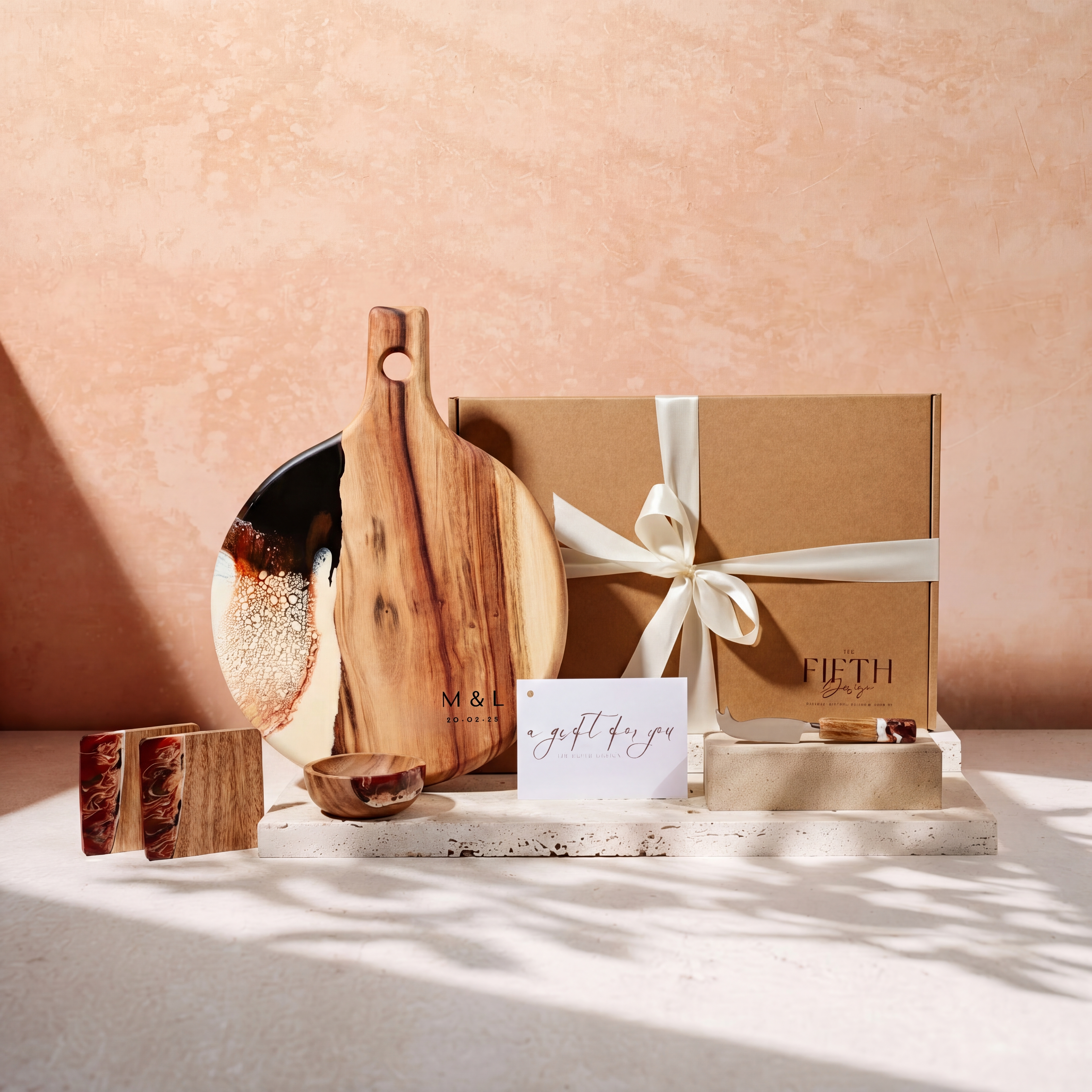The Grazing Gift Box in Burnt Ivory - styled lifestyle hero, bundle arranged on travertine in warm editorial light