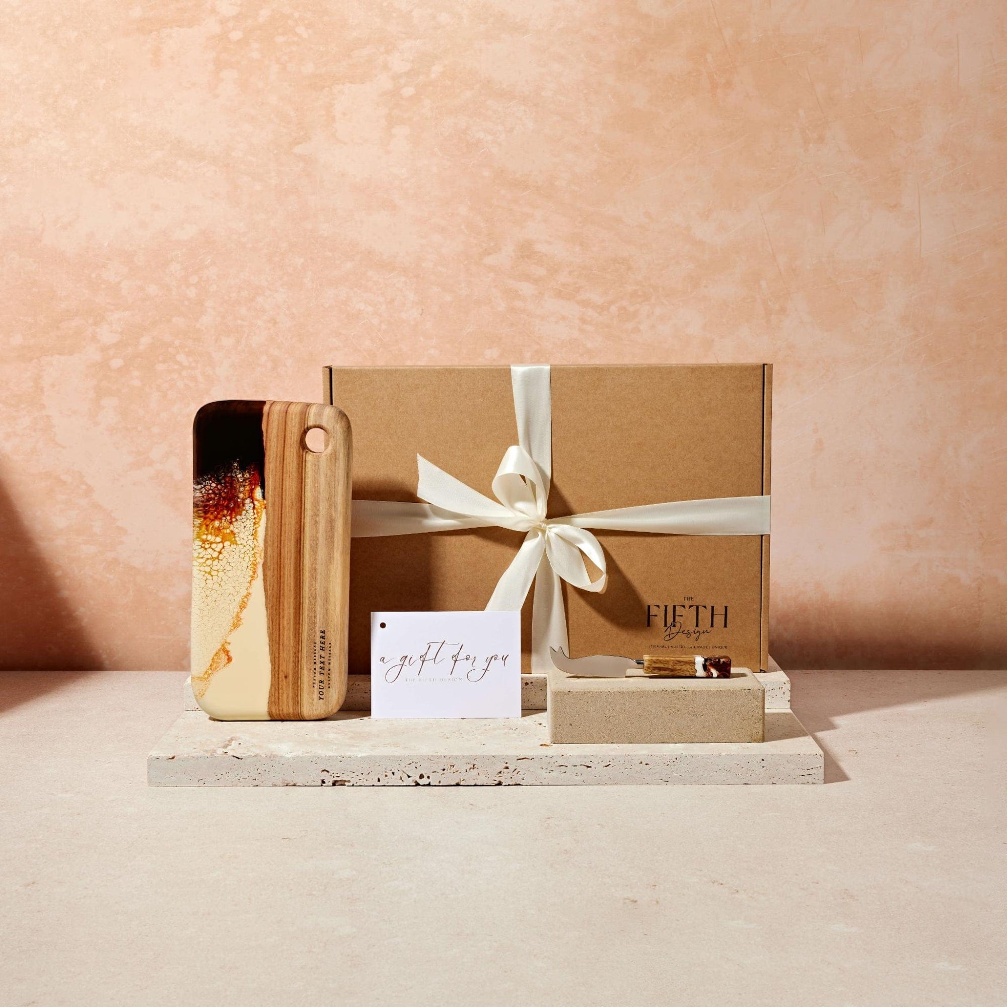 The Nibbles Gift Box in Burnt Ivory - Complete bundle laid out on white background, top-down view