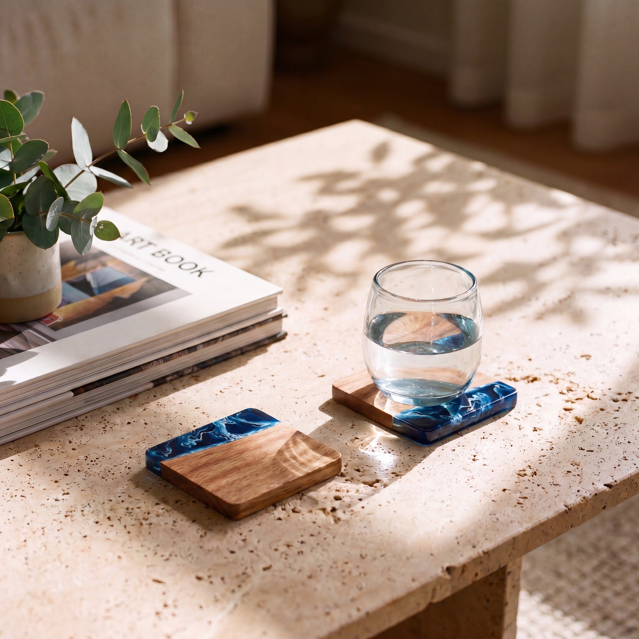 Prussian Blue resin and wood coasters on a coffee table