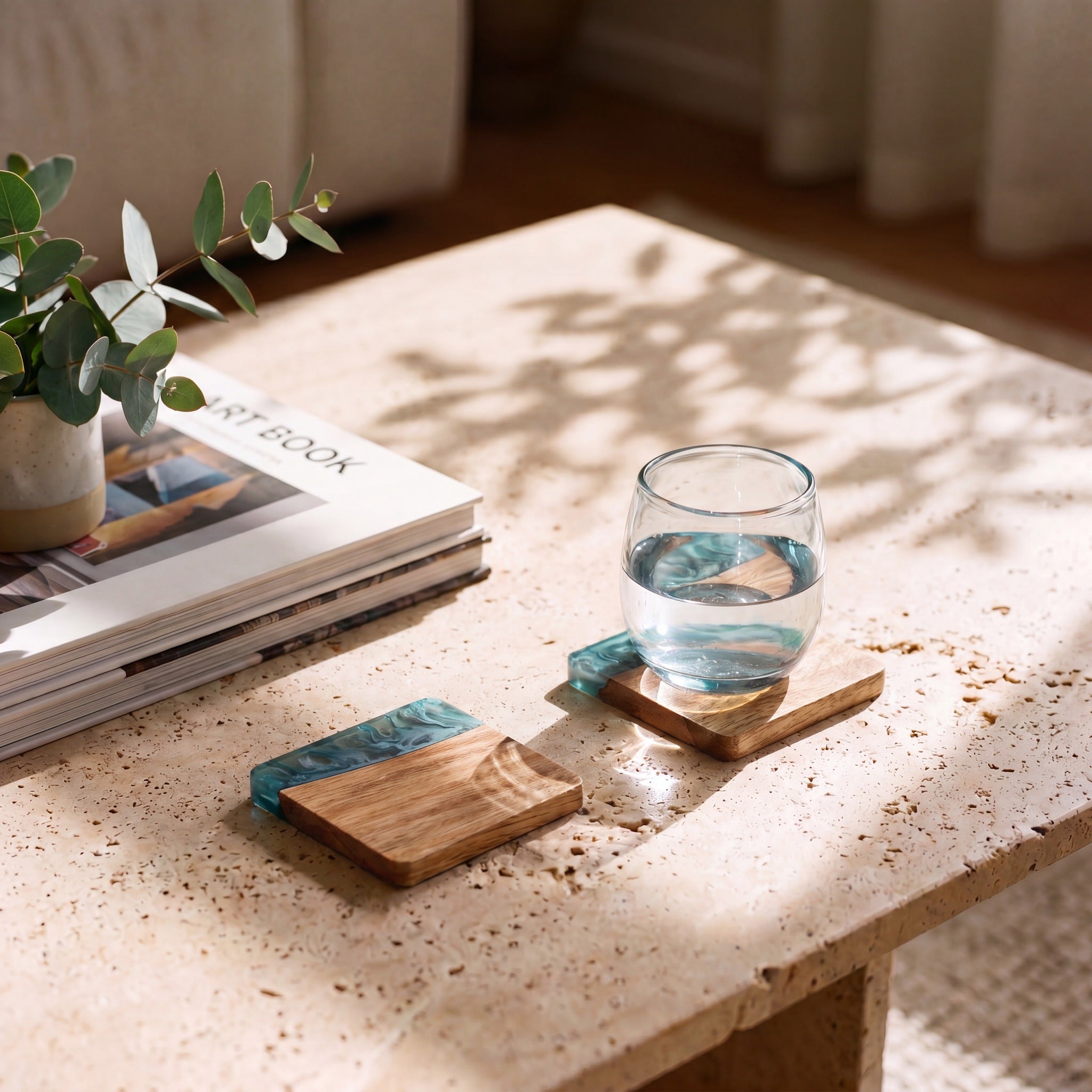 Slate resin and wood coasters on a coffee table