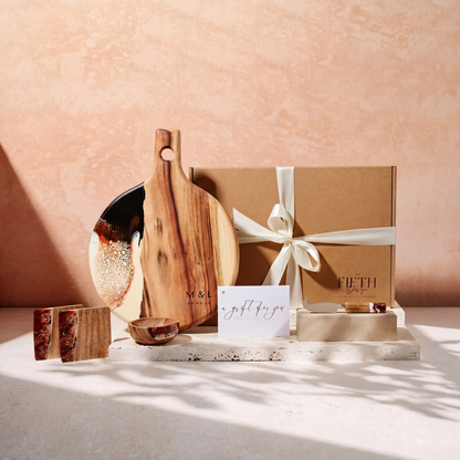 The Grazing Gift Box in Burnt Ivory - styled lifestyle hero, bundle arranged on travertine in warm editorial light