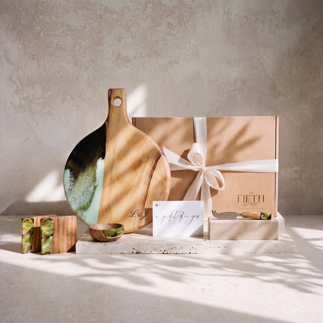 The Grazing Gift Box in Sage Green - styled lifestyle hero, bundle arranged on travertine in warm editorial light