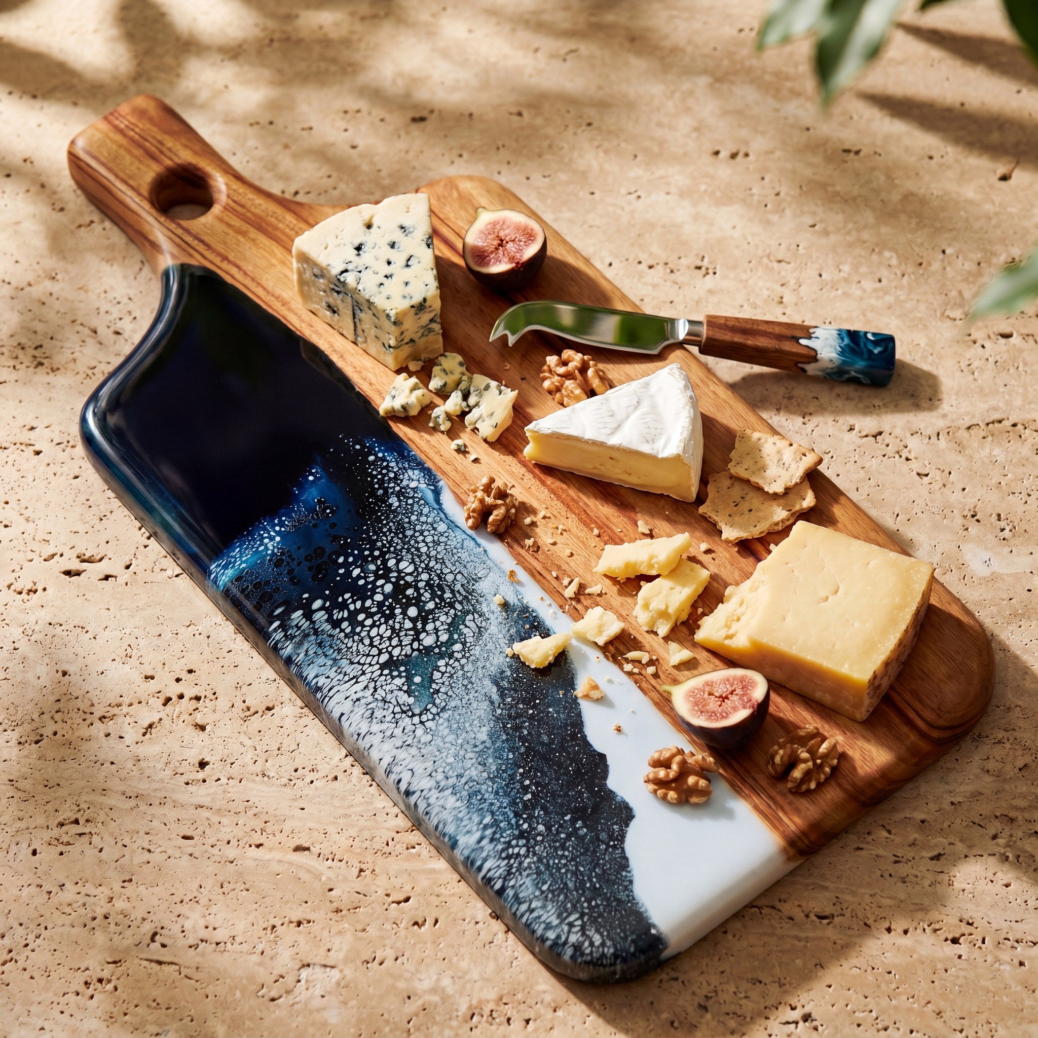 Resin Cheese Knife in Prussian Blue - styled on a serving board #colour_prussian-blue