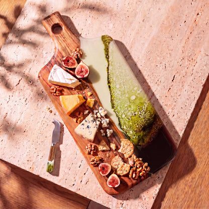 Resin Cheese Knife in Sage Green - styled on a serving board #colour_sage-green