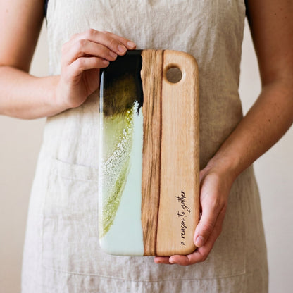 Nibbles Gift Box in Sage Green - Board held in hand for scale 