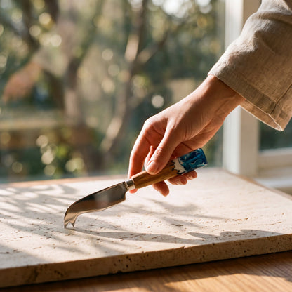Nibbles Gift Box in Seascape - Cheese knife in hand 