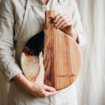 Round Resin Paddle in Burnt Ivory - Styled flat lay with dried flowers and linens #colour_burnt-ivory