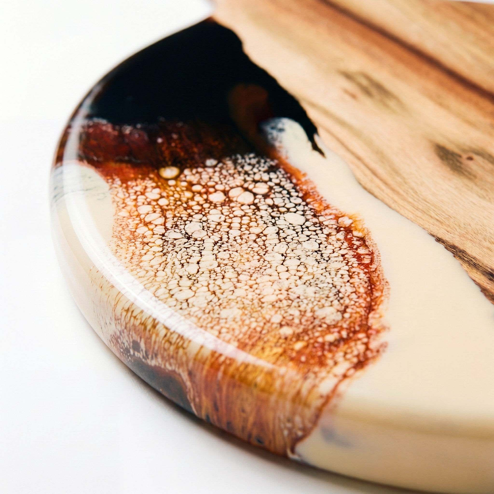 Round Resin Paddle in Burnt Ivory - Close-up of resin colour detail and natural Camphor Laurel grain #colour_burnt-ivory