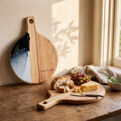 Round Resin Paddle in Prussian Blue - Lifestyle scene with cheese and accompaniments styled on board #colour_prussian-blue