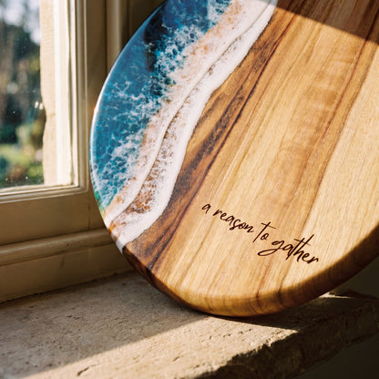 Round Resin Paddle in Seascape - Angled detail shot showing resin pattern and timber edge #colour_seascape