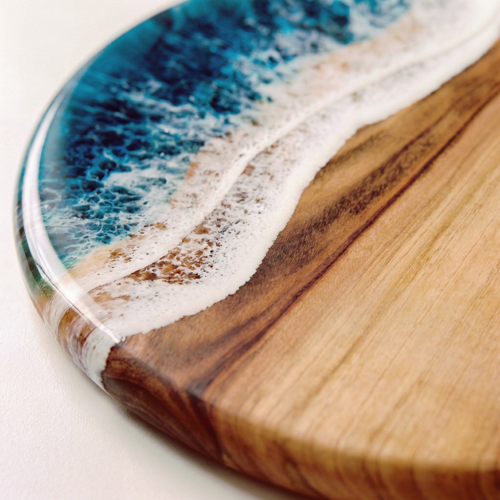 Round Resin Paddle in Seascape - Close-up of resin colour detail and natural Camphor Laurel grain #colour_seascape