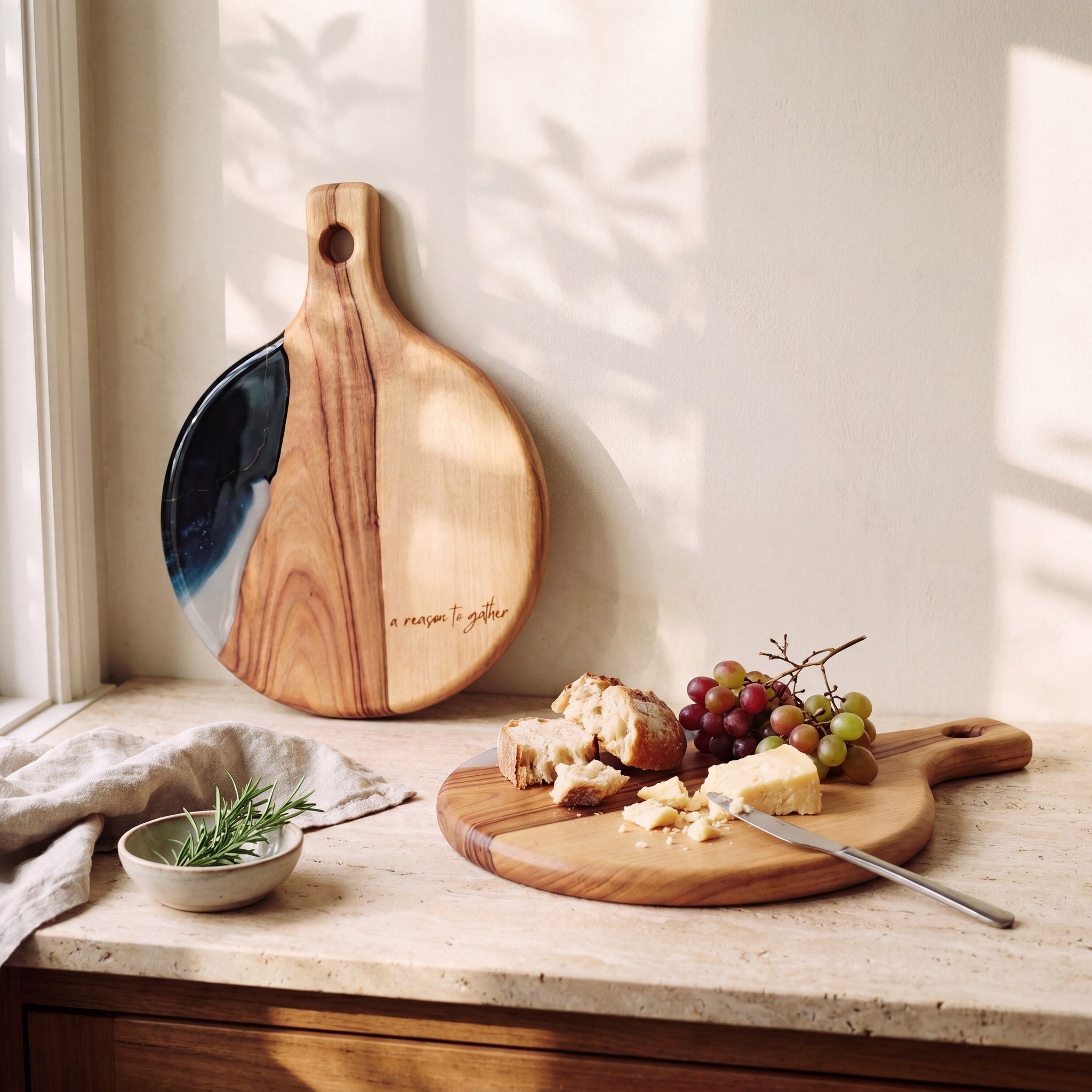 Round Resin Paddle in Slate - Lifestyle scene with cheese and accompaniments styled on board #colour_slate