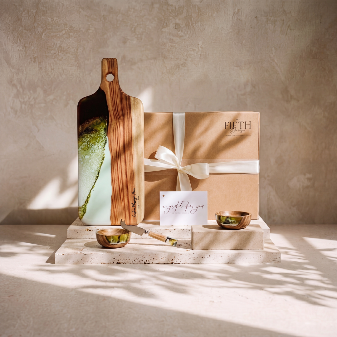 The Ultimate Gift Bundle in Sage Green - styled lifestyle hero, bundle arranged on travertine in warm editorial light