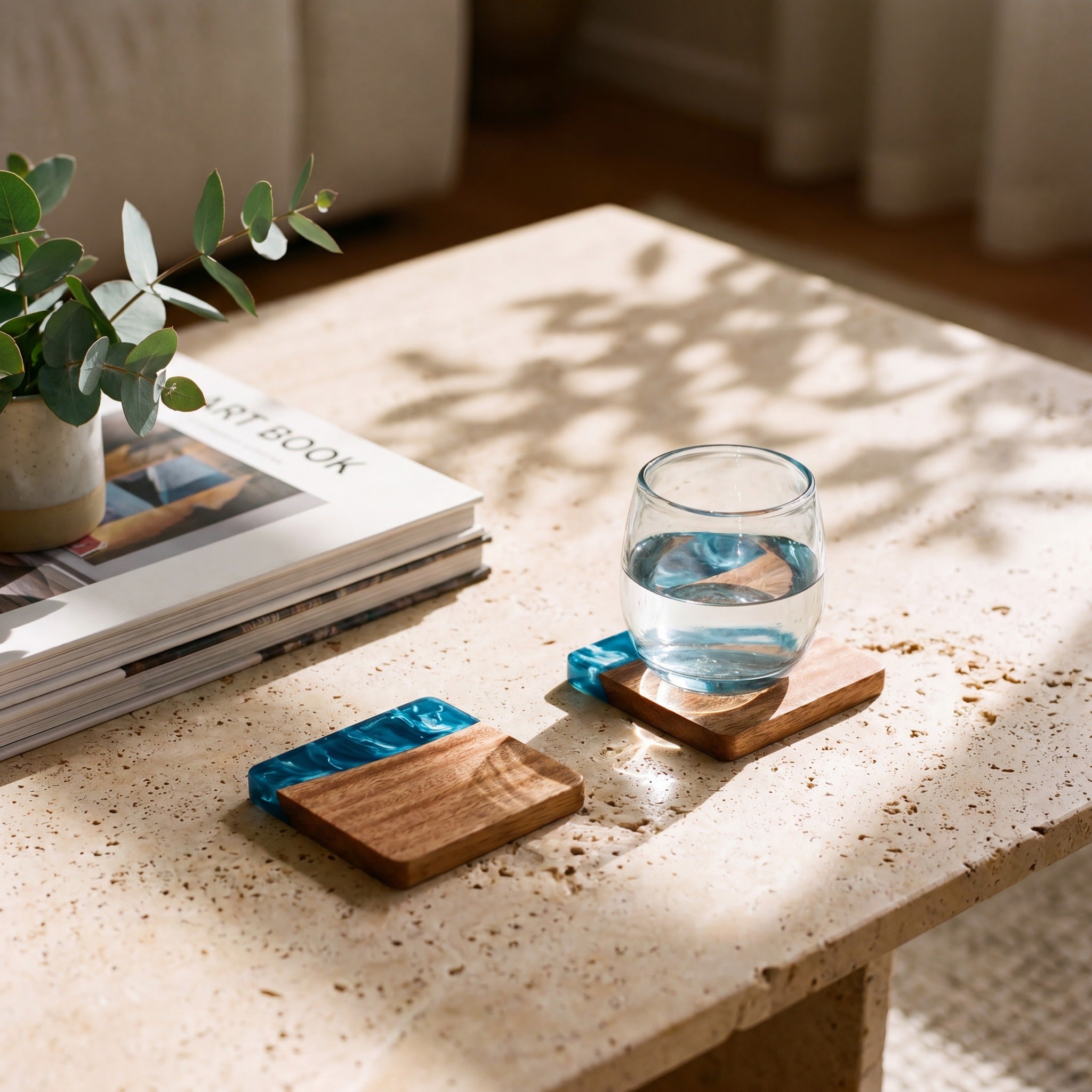 Seascape resin and wood coasters on a coffee table